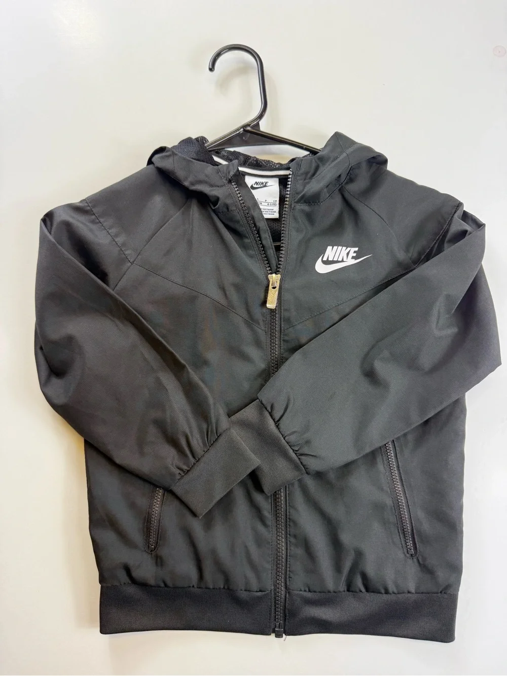 Nike Kids Black Hooded Rain Jacket with White Logo